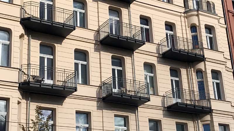 Mieter in Berlin: Was muss man zum Mietendeckel wissen? Mietshaus,Mietendeckel