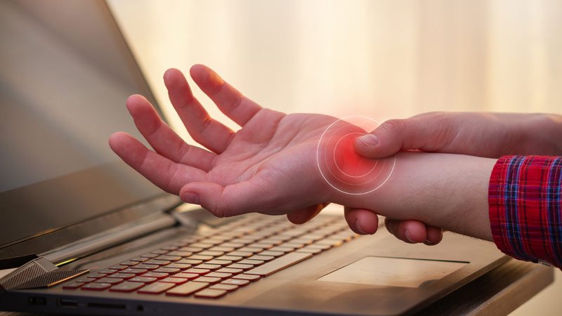 Laptop,Handgelenk,Schmerzen,Berufskrankheit